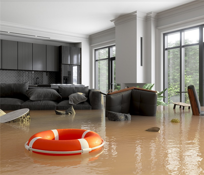 a flooded house with furniture floating everywhere